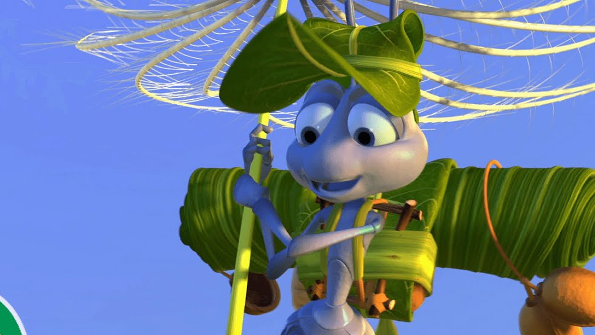 Flik, una hormiga valiente, volando sobre un diente de león en la película Bichos